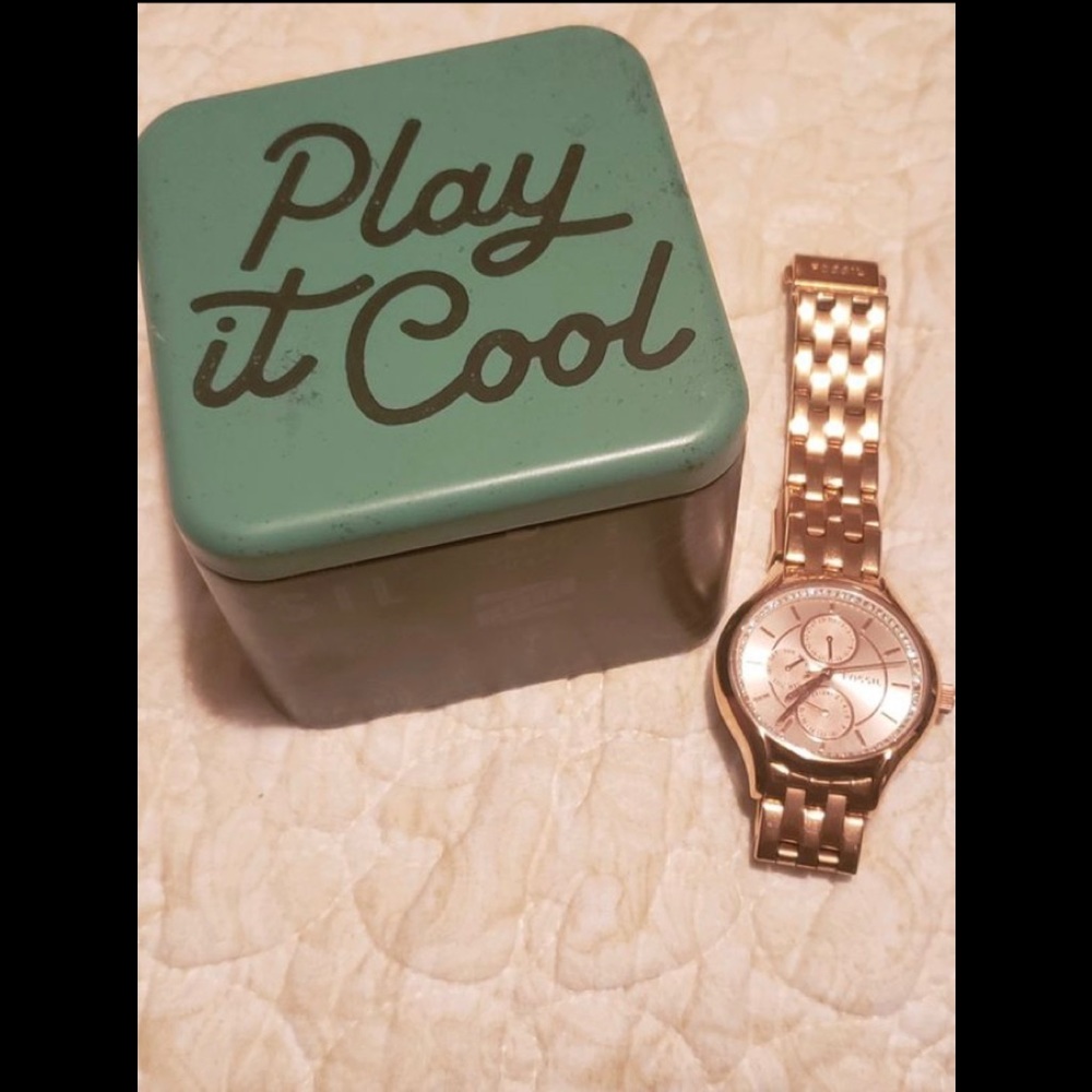 Gold Fossil watch